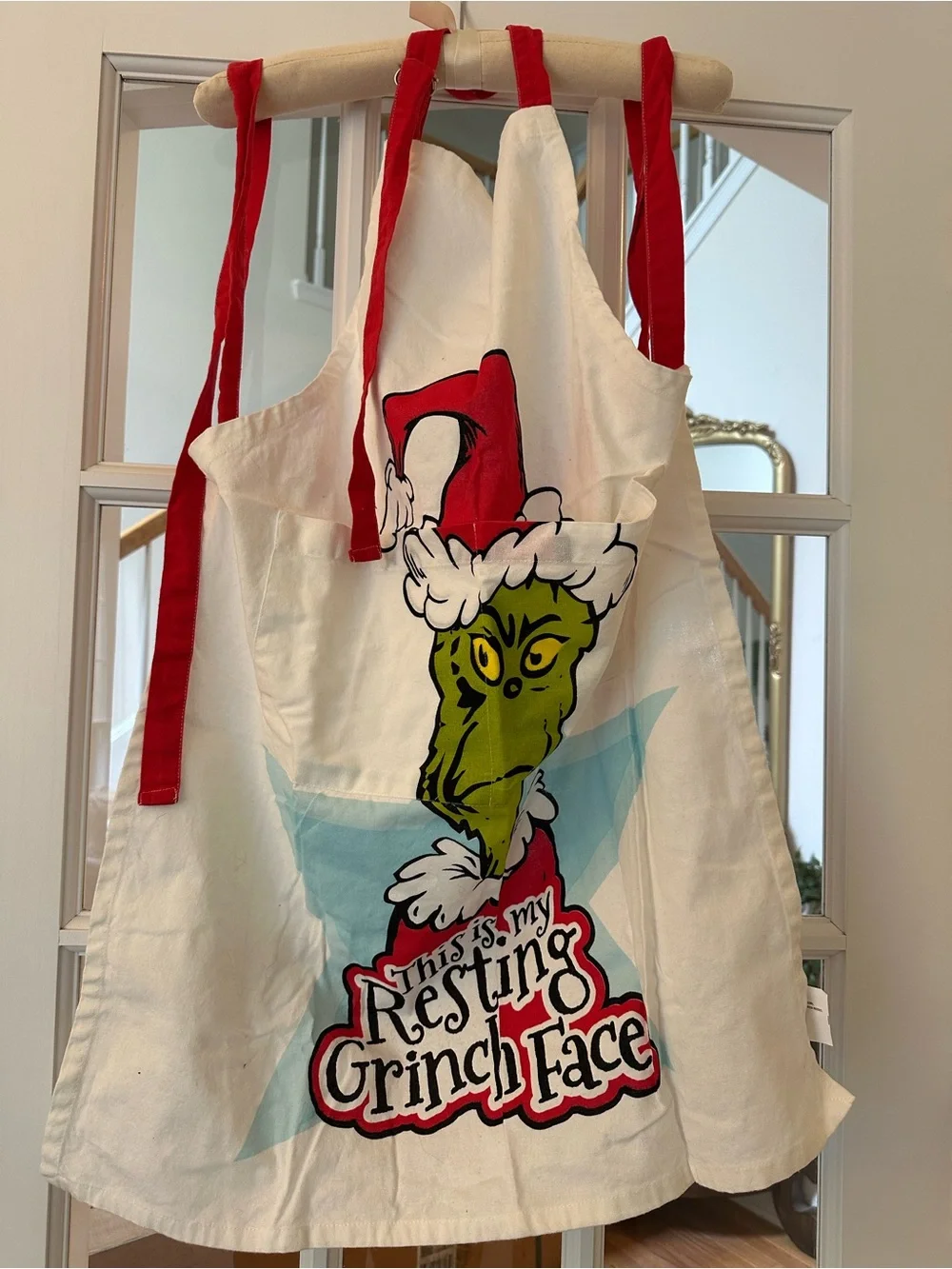 The Grinch Holiday Apron with Red Trim Resting Grinch Face Christmas Apron